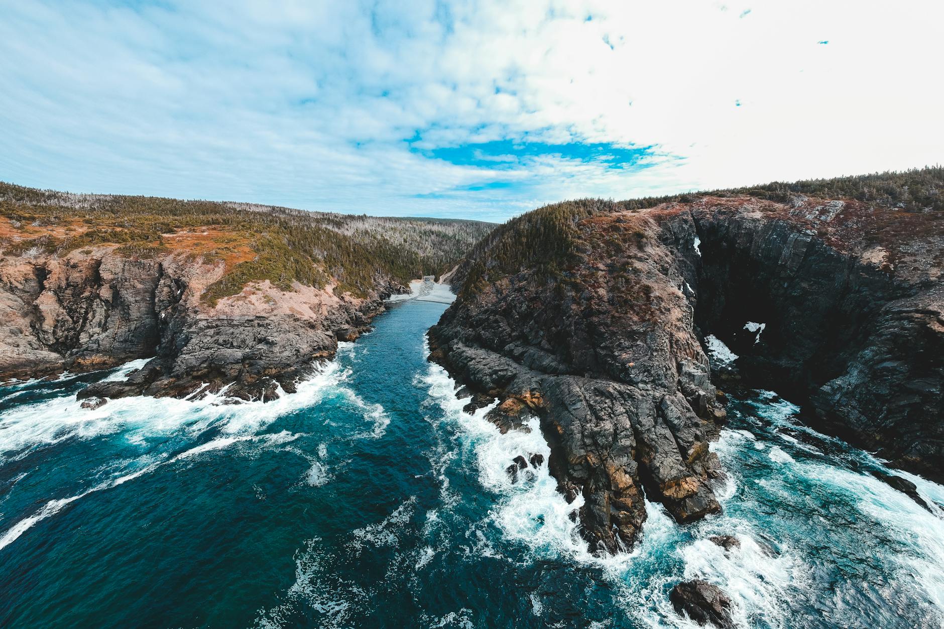 scenery of river head stream on rocky coastline