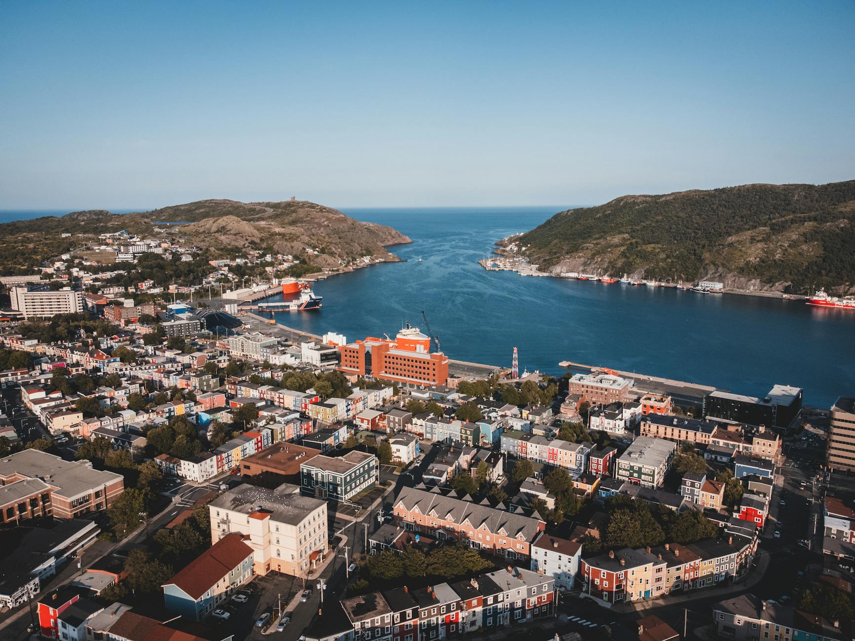 aerial view of city near body of water